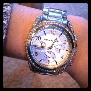 Woman’s silver Michael Kors watch MK5165